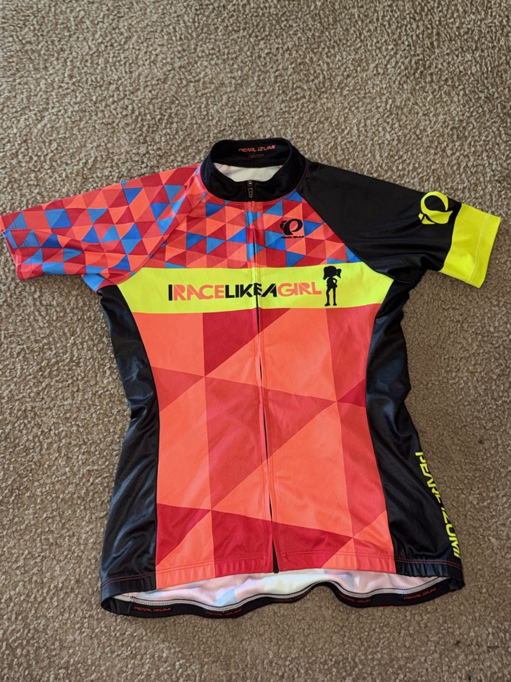 Pearl Izumi Women's Geometric Cycling Jersey in Red, Blue & Black